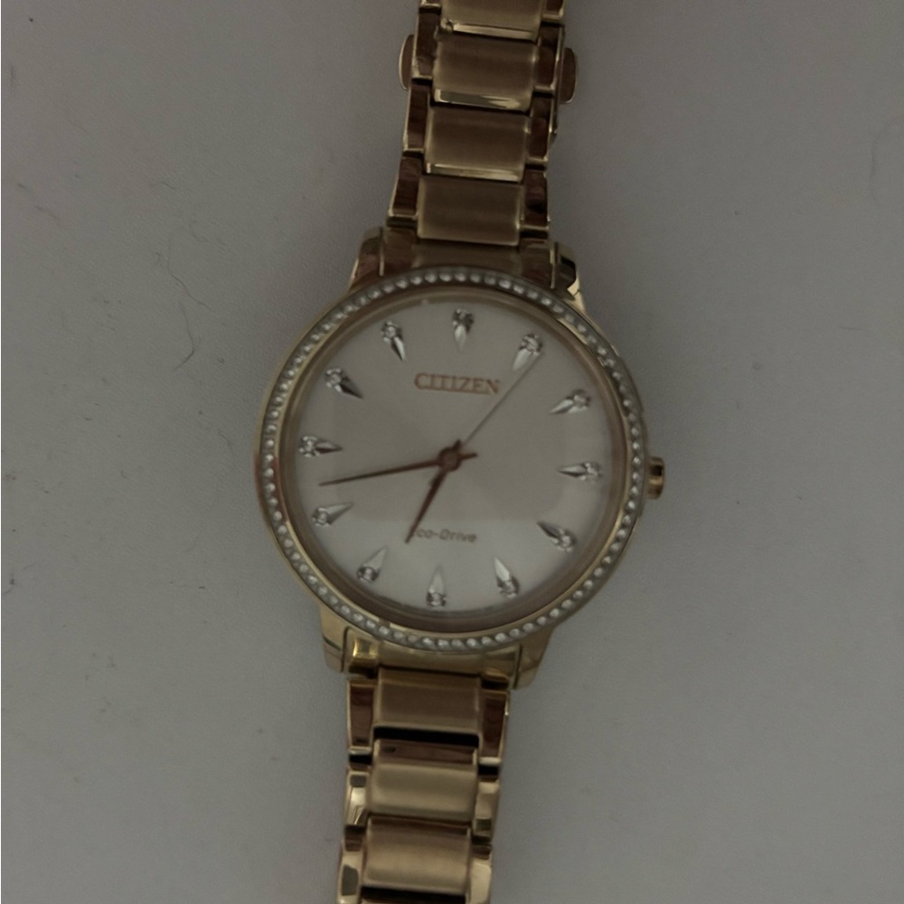 Citizen Women's Gold Eco-Drive Watch.